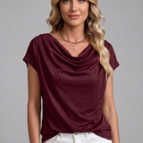 Damenbluse mit Schalkragen und Drapierung vorne