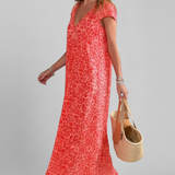 Damenkleid mit V-Ausschnitt und bedruckter Oberfläche