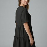 Damenkleid mit V-Ausschnitt und Rüschendetail