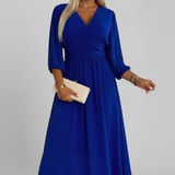 Damenkleid mit V-Ausschnitt und Wickelbund